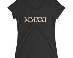 a women's t - shirt with the word mmxvi printed on it