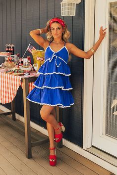 Americana Kisses Tiered Mini Dress in Royal Blue Summer Blue Dress With Bow Straps, Summer Blue Dresses With Bow Straps, Blue Summer Dress With Knotted Straps, Chic Spaghetti Strap Mini Dress For Picnic, Blue Sundress With Ruffled Straps For Day Out, Blue Dresses With Bow Straps, Sundress With Spaghetti And Bow Straps For Brunch, Spaghetti Strap Sundress With Bow Straps For Brunch, Blue Sleeveless Dress With Bow Straps