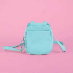 A crossbody purse of Son the Frog. made with vegan leather can fit an entire Nintendo Switch Lite inside. can fit a normal Switch if you remove the joycons. perfect for carrying your phone, wallet, keys, and a piece of lint. maybe 2. clear window in the front allows you to display your pins, merchandise, or whatever other little shiny goblin trinkets you might collect without worrying about them falling off! Features: a very handsome frog flap that resembles Son the Frog’s face. has 2 magnetic b Cute Rectangular Phone Bag For Everyday Use, Cute Travel Phone Shoulder Bag, Cute Everyday Crossbody Phone Bag, Ita Bag, Nintendo Switch Lite, Purple Interior, Clear Window, Pink Interior, Wet Wipe