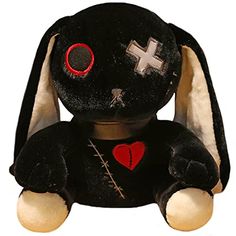 a stuffed animal with a cross on it's chest