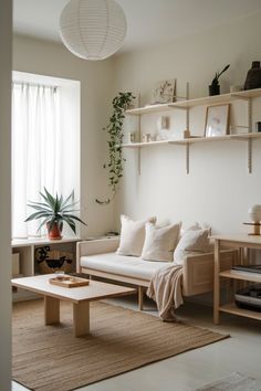 a living room filled with furniture and plants