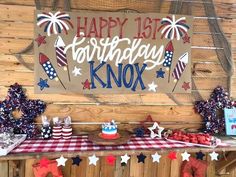 a fourth of july birthday party with red, white and blue decorations