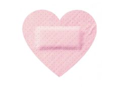 a pink heart shaped object with dots on it's side and a white background