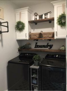 the laundry room is clean and ready to be used as a washer and dryer