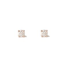 "This finely handcrafted tiny solitaire stud earring is made with a 1mm (diameter) genuine GVs1 quality round brilliant cut natural real Diamond & set into a traditional four prong setting composed of 14K solid gold. Comes with secure matching 14K solid gold earring backs. ♦ Diamond Dimensions: approximately 1.5mm (d) ♦ Post Thickness: 20 gauge (0.8mm) ♦ Metal Finish: High Shine Polish ♦ This design is available in Rose, White & Yellow 14K Gold ♦ Backing Type: your choice of Push Back or Minimalist White Diamond Earrings With Single Diamond, Minimalist White Diamond Earrings With Single Stone, White Diamond Earrings For Gift, Minimalist Solitaire Round Cut Earrings, Minimalist Solitaire Earrings, Minimalist Solitaire Round Earrings, Everyday White Diamond Earrings With Single Diamond, Minimalist Round Solitaire Earrings, Everyday White Single Diamond Earrings