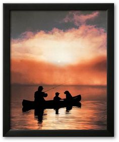 two people in a boat fishing at sunset