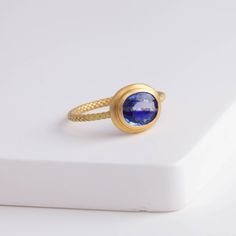 Description One-of-kind 18k yellow gold ring with a unique bi-color oval sapphire with darker and light blue hues, set in an east-west setting. The color of this sapphire is like seeing where the sky and the ocean meets at the horizon. This ring is in a rope design, adding a little more detail to every part of the ring. Details 18k Yellow Gold Size of sapphire – 7.1 x 6.1 x 2.8 mm (1.17 ct) Made in Japan *Please note that due to the natural quality of the stones, there may be inclusions, cracks, Rope Design, 18k Yellow Gold Ring, Yellow Gold Ring, East West, The Horizon, Blue Hues, Yellow Gold Rings, The Ocean, The Sky