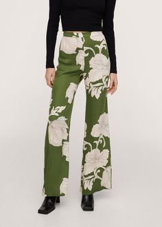 Expertly crafted in a green floral design, this border print pant and jacket suit offers a professional, yet stylish look. With its seamless blend of functionality and fashion, this set is perfect for women who want to maintain a polished and sophisticated appearance without sacrificing style. Measurements are in inches Size Chest Waist Hips Length S 34 25 33 39 M 36 27 35 39.5 L 38 29 37 40 Please take note of the size measurement when ordering your size. Hipster Trousers, Hipster Pants, Floral Trousers, Print Pant, Jacket Suit, Chic Pants, Boho Green, Flare Leg Pants, Printed Trousers