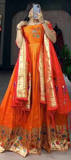 Orange color Gown in Jacquard fabric with Printed work Multicolor Party Gown With Pallu, Formal Gown With Traditional Drape For Festivals, Floor-length Brocade Gown For Reception, Orange Gown With Pallu For Festive Occasions, Festive Orange Gown With Pallu, Party Gown In Brocade With Traditional Drape, Brocade Dress For Party And Festivals, Festive Floor-length Brocade Gown, Elegant Gown With Pallu For Celebration