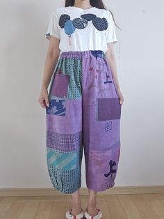 https://antiqueshopjunna.etsy.com Thank you for viewing. I made pants by dyeing tenugui cloth. Size: Pants length 90cm, elastic waist circumference - 110cm, hip circumference 118cm, rise 40.5cm, inseam 55cm, hem circumference 46cm, partially elastic hem. 100% cotton, no lining. 1 pocket Shipping: Items are shipped via International e-packet light. (Include Tracking) Delivery will take an AVERAGE of 2~3weeks. Caution: Import duties, taxes, and charges are not included in the item price or shipping cost. These changes are the buyer's responsibility. Please check with your country's customs office to determine what these additional costs will be prior to buying. Kimono Remake, Patchwork Pants, Womens Jumpsuits, Waist Circumference, Pants Length, Jumpsuits For Women, Labour Day, Jumpsuit Romper, Elastic Waist