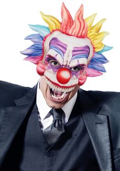 a man in a suit and clown mask