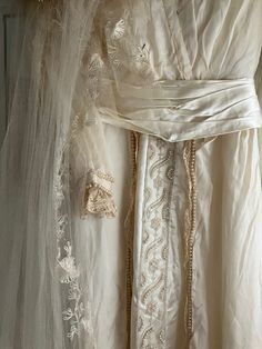 Cream Floor-length Gown For Ceremony, Cream Floor-length Wedding Dress For Ceremony, Traditional Cream Wedding Dress, Beige Floor-length Wedding Dress, Traditional Cream Wedding Gown, Traditional Cream Dress For Ceremony, Embroidered Cream Wedding Gown, Cream Wedding Dress With Intricate Embroidery, Elegant Embroidered Dresses For Marriage