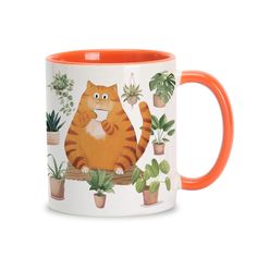 an orange and white coffee mug with a cat sitting on a branch surrounded by succulents