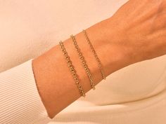 This 14k Yellow Gold 3.0mm Rolo Chain Bracelet is ideal for everyday wear and can be paired with any outfit. It is made of solid gold, which won't tarnish or lose its color, so you can enjoy this beautiful bracelet for years to come. • Material: 14k Solid Gold (Stamped 14K for authenticity) • Color Options: Yellow Gold • Chain Style: Rolo Chain • Chain Width: 3.00 mm • Clasp Type: lobster clasp • Available Lengths: 5", 5.5", 6", 6.5", 7", 7.5", 8" For custom lengths feel free to contact us. We c Classic Rolo Chain Bracelet For Everyday, Modern Everyday Rolo Chain Bracelet, Classic Gold Bracelet With Rolo Chain, Classic Gold Bracelet With Rolo Chain For Everyday, Everyday Gold Link Bracelet With Rolo Chain, Classic Gold Rolo Chain Bracelet, Elegant Everyday Bracelets With Rolo Chain, Classic Yellow Gold Rolo Chain Bracelet, Classic 14k Gold Bracelet With Rolo Chain