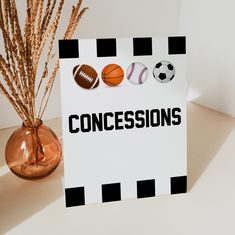 there is a card with the word concessions on it next to a vase filled with balls