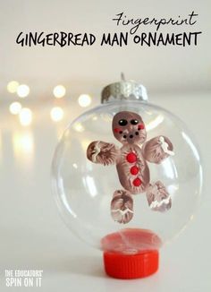 a gingerbread man ornament in a glass ball