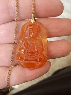 Beautiful Vintage 1/20th 14K Gold Filled Carved Carnelian Buddhist / Buddha  Pendant / Necklace Pendant measures: 1.75" with bale 24" Gold Filled Chain  Excellent Condition! Nice Gift Item! Thanks for viewing my item! Carved Orange Jewelry For Gifts, Carved Orange Jewelry For Gift, Gold Carnelian Jewelry For Meditation, Buddha Pendant Necklace, Gold Buddha, Buddha Pendant, Gold Filled Chain, Necklace Pendant, Favorite Things Gift