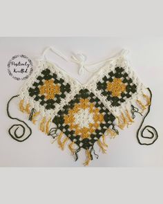 This playful granny square crop top with tassels is perfect fit for beach, festival or any hot summer day!  Colours: green, yellow, white. Material: cotton yarn. Straps: adjustable. Breast support: none. Size: UK 8 - UK 12. (Cup size up to DD) Hand made in a smoke free and pet free environment. Please note colours may vary do to your screen settings. Crochet Cotton Top, Granny Square Crop Top, Square Crop Top, Haut Transparent, Crop Top Crochet, Beach Festival, Yellow Crop Top, Top Halter, Yarn Sizes