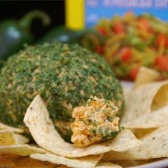 an assortment of food including tortilla chips and salsa