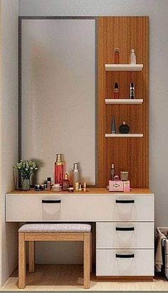 a white vanity with two drawers and a mirror on the wall next to it is a stool