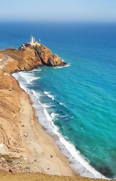 an aerial view of the beach and ocean