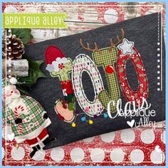 an applique pillow with the number 100 on it and santa clause in front