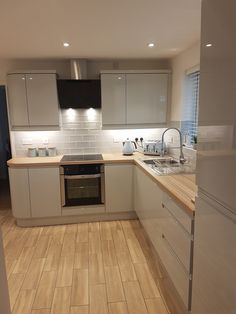 the kitchen is clean and ready for us to use in its new owner's home