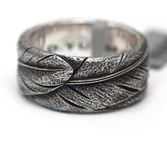 For sale is a brand new, never used, genuine and authentic David Yurman Men's 11mm Southwest Feather Band Ring in Sterling Silver -It lists for $450 -Size 10 -Approximately 11mm Sterling Silver Band Ring with feather design -Inside marked with (c) D.YURMAN 925 -The ring comes in a gift box with a David Yurman Pouch, and certificate of authenticity.  -I ship for free with USPS priority mail with insurance.  I also offer express service for $20 David Yurman Mens, Sterling Silver Rings Bands, Feather Design, Men Jewelry, Men's Jewelry Rings, Silver Band Ring, Sterling Silver Bands, David Yurman, Sterling Ring