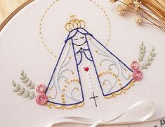 a cross stitch pattern with the image of a woman in a wedding dress on it