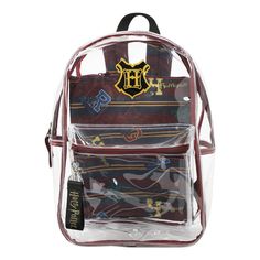 Whether you’re off to a day at the theme park or just headed work, do so with this Harry Potter clear backpack! Made of clear PVC, this backpack has been custom designed with a rubber applique of the Hogwarts crest. Measuring 16 inches in height, this backpack is the perfect size for carrying your most important essentials comfortably. The metal top zipper ensures easy access to the spacious main compartment, where you’ll find a detachable zipper pouch ideal for storing your most valuable posses Themed Student Backpack, Clear Backpack For Back To School, Back To School Clear Backpack, Back To School Clear Backpack For School, Back To School Plastic Backpack, Back To School Plastic Standard Backpack, Back To School Standard Plastic Backpack, Standard School Backpack In Plastic, Plastic Standard Backpack For School