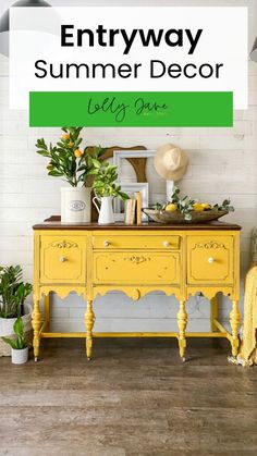 an old dresser painted yellow and decorated with oranges, lemons and greenery