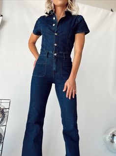 Long inseam Denim Jumpsuit Stretchy, comfy denim. True to size, 35.5" inseam SIZE DOWN IF IN BETWEEN SIZES Fitted High Waist Denim Jumpsuit In Utility Style, Fitted High Waist Denim Utility Jumpsuit, Fitted High-waist Denim Utility Jumpsuit, High Rise Denim Blue Utility Jumpsuit, High Waist Fitted Utility Jumpsuits And Rompers, Fitted High Waist Utility Jumpsuits And Rompers, Utility High Rise Denim Jumpsuits And Rompers, High Rise Denim Utility Jumpsuits And Rompers, Dark Wash High Rise Jumpsuits And Rompers With Pockets