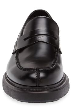 A classic penny keeper and apron toe add timeless sophistication to a leather loafer grounded by a treaded rubber sole. Leather upper and lining/rubber sole Made in Italy Black Slip-on Loafers With Rubber Sole, Luxury Buckle Closure Slip-on Loafers, Luxury Men's Slip-on Loafers, Luxury Black Semi-formal Loafers, Luxury Gentleman's Slip-on Loafers, Penny Loafers Men, Men Loafers, Rollerball Perfume