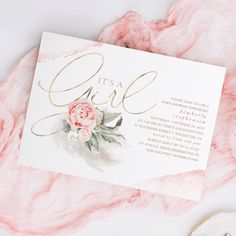 it's a girl baby shower card with pink flowers and greenery on top