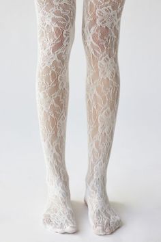 Lacy and racy tights in a range of bold colors. Due to their delicate nature, wear with care. Content + Care 94% Nylon, 6% spandex Hand wash Imported | Maude Lace Tight in White, Women's at Urban Outfitters Funky Tights, White Tights, I'm With The Band, Inspiration Mode, Aesthetic Clothes, Pretty Outfits, Fashion Inspo Outfits