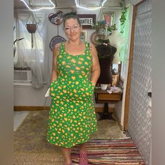 Tabitha Brown Green Orange & Yellow Floral Midi Dress Size Xxsmall Pre-Loved! Approximate Measurements, Flaws (If Any) & Fabric Tag All Shown In Photos. Model :Me 5ft 2in 149 Lbs Measure H:39in W:32in C:34in / Average Size 6/8 / Small / Shoe Size 7.5 Smoke Free Home. All Items Are 100% Authentic And Ship Next Day From Sunny Florida. Offers / Counter Offers Always Welcome!! *** Feel Free To Comment Or Message Me With Any Questions. *** I Will Accept Or Counter My Lowest. Bundles Always Get A Disc Orange Fitted Midi Sundress, Orange Cotton Midi Sundress, Fitted Orange Cotton Midi Dress, Yellow Cotton Knee-length Sundress, Tabitha Brown, Fabric Tags, Brown Dress, Floral Midi Dress, Green Orange