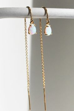 These Opal Drop Earrings are a beautiful touch of sparkle for your everyday. High quality 14ktgold filled theader earrings with tiny teardrop opals, a perfect gift for her or you! D E T A I L S These gorgeous earrings are created with high quality 14kt Gold Filled ear threaders. Attached to the end is a tiny synthetic opal teardrop. ∙ EXTRA LOVE ∙ Crafted and curated just for you in the desert of our Arizona studio. All of our jewelry comes gift packaged! We are happy to leave a note if this is Gold Threader Earrings, Jewelry Gold Earrings, Simple Silver Earrings, Tiny Gold Earrings, Large Drop Earrings, Simple Gold Earrings, Bridesmaid Gifts Earrings, Opal Drop Earrings