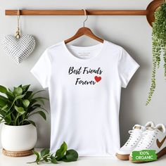 Celebrate the unbreakable bond of friendship with this charming Best Friends T-shirt.  Crafted from soft and breathable cotton, this tee is as comfortable as it is stylish. The vibrant colours and playful design make it a fun and trendy addition to any casual outfit.  Whether you're enjoying a day out with your bestie or looking for a thoughtful gift, this t-shirt is a perfect choice. Let your shirt reflect the special connection you share with your best friend, a symbol of joy and companionship Cotton Slogan T-shirt As Gift, White T-shirt For Summer Gift, Summer Gift T-shirt With Text Print, Summer Letter Print Top, White Summer T-shirt For Gifts, White Summer T-shirt For Gift, White Summer T-shirt Gift, Casual Tops With Funny Text For Gifts, Summer Text Print T-shirt For Gift