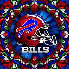 a stained glass window with the buffalo bills helmet on it and flowers in the background