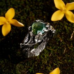 "Meet \"Sierra\" - exquisitely vintage rose cut ring looking very naturally thanks to its fine jewelry work. A gorgeous moss agate gemstone is the centerpiece of this pretty, statement ring, surrounded by lianes, vines and leaves from sterling silver. This engagement ring will definitely blow away your special someone! \"Sierra\" nature ring is perfect to say these three little words.  It's so nice and versatile!  Details of Moss Agate Ring \"Sierra\": * 925 Sterling Silver  * Natural Moss Agate Moss Agate Engagement Ring Male, Magical Engagement Ring, Mens Moss Agate Ring, Witchy Wedding Rings, Wedding Rings Nature, Twig Ring Engagement, Earthy Wedding Rings, Moss Agate Wedding Ring, Rose Cut Ring