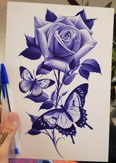 a drawing of a purple rose and butterflies on a white paper with a blue marker