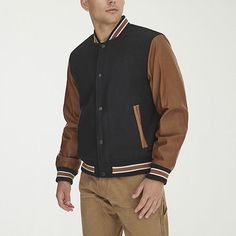 Elevate your look with the Levi's Men's Mixed Media Bomber Jacket, crafted with a stylish blend of wool and sleek faux leather. Designed with a banded hemline, neckline, and cuffs for a tailored fit, it features a full zipper and snap closure for versatile wear, along with two side slip pockets for everyday convenience. Don't miss out on this must-have piece to upgrade your wardrobe.Features: Elastic BottomClosure Type: Snap & ZipperNeckline: Collar NeckPockets: 2 Side Slip Pockets, 1 Inside Ce… Bomber Jackets, Levis Men, Snap Closure, Mixed Media, Bomber Jacket, Coats Jackets, Faux Leather, Wool, How To Wear