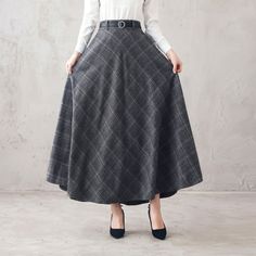 "This winter wool skirt is a classic piece of tailoring that will see you through rain or shine. It is cut with a flattering flared skirt to give you a wonderful shape. The winter skirt is perfect classic styling and ends at the ankle. This is a versatile skirt that you'll wear again and again. DETAILS: * More colors available https://etsy.me/2WgHgmy * 30% wool, 30% fiber, 40% polyester * fully satiny liner * Two side pockets * Right zip closure * with belt loops * back elastic band to provide s Classic High Waist Skirt For Fall, Classic High-waist Skirt For Fall, Wool Long Skirt For Workwear, Long Wool Skirt For Workwear, Classic Wool A-line Skirt, Winter Maxi Skirt For Workwear, Classic A-line Wool Skirt, Wool Flared Skirt With Relaxed Fit, Fitted Wool Full Skirt