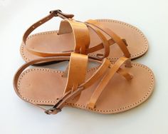 ♥ A pair of high quality,100% genuine Greek leather sandals ♥ You can wear them all day, they are very comfortable ♥ Perfect for everyday adventures, beach, bridal If you take half size, go UP to the nearest whole size. Ladies shoe sizes EU3536373839404142 UK23-3.54566.578 USA4.5567891011 cm23.123.824.425.125.826.527.2....27.8 inches__9.19.39.69.910.1510.410.710.9 YOU CAN FIND MORE THAN 120 SANDAL DESIGNS IN MY SHOP: https://www.etsy.com/shop/GrecianSandals?ref=seller-platform-mcnav The sizes up Ladies Shoe, Beige Vest, Leather Sandals Handmade, Leather Gladiator Sandals, Handmade Sandals, Beach Bridal, Everyday Adventures, Kitenge, Leather Sandals Women