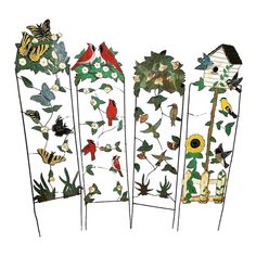 four metal garden stakess with birds and flowers on them, each holding a birdhouse