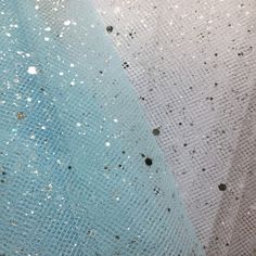 an up close shot of the fabric with sequins