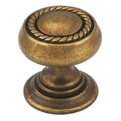 an antique brass door knob with roped design on the top and bottom, is shown