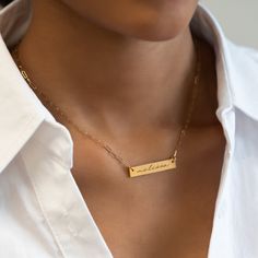 This personalized engraved bar necklace is the perfect keepsake jewelry piece. Bar 1.2x0.2in (31x5mm) Adjustable chain length: 17-20in (38-51cm) Laser Engraving Gold Filled Spring clasp closure Hypoallergenic, lead and nickel free #252GF Elegant Customizable Rectangular Name Necklace, Personalized Silver Bar Necklace With Rectangular Pendant, Dainty Bar Necklace With Cable Chain For Gift, Dainty Bar Necklace With Cable Chain As A Gift, Personalized Gold Bar Necklace As Gift, Dainty Bar Necklace With Cable Chain, Elegant Silver Bar Necklace With Custom Name, Personalized Gold Bar Necklace For Gift, Personalized Silver Bar Necklace