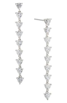 A line of faceted cubic zirconia illuminates these stunning drop earrings that are hand-polished to an exquisite shine. 2" drop; 1/4" width Post back Rhodium plate or 18k-gold plate/cubic zirconia Imported Rhodium Plated, Cubic Zirconia, 18k Gold, Gold Plate, A Line, Jewelry Earrings, Women Jewelry, Nordstrom, Drop Earrings