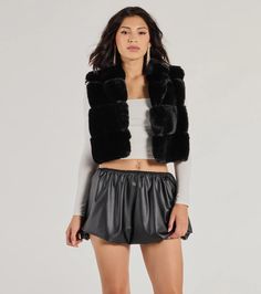 Craft the perfect luxe look for the chilly season with this faux fur cropped vest accented with a chic striped-like seam design. It features a sleeveless collared neckline, an open front with hook-eye closures, side pockets, and a relaxed fit.Fit & FeaturesSoft faux fur fabric with smooth woven lining, no stretchStriped-like seam designCollared necklineOpen front, hook-eye closuresDual lined side pocketsCropped hem, relaxed fitRuns true to size Fur Fabric, Cropped Vest, Faux Fur Fabric, Outerwear Vest, Hook Eye, Black Maxi Dress, Trending Now, Windsor, Faux Fur